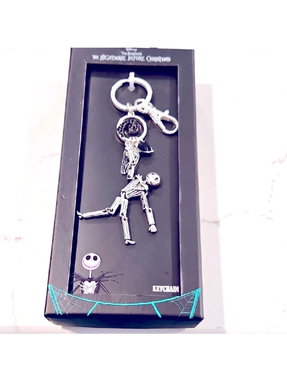 Silver Skeleton Keychain - Official Merchandise